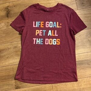 The shirt says it all for dog lovers!